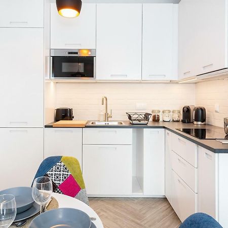 Apartments Rondo Wiatraczna By Noclegi Renters Varsovie Extérieur photo