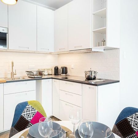 Apartments Rondo Wiatraczna By Noclegi Renters Varsovie Extérieur photo