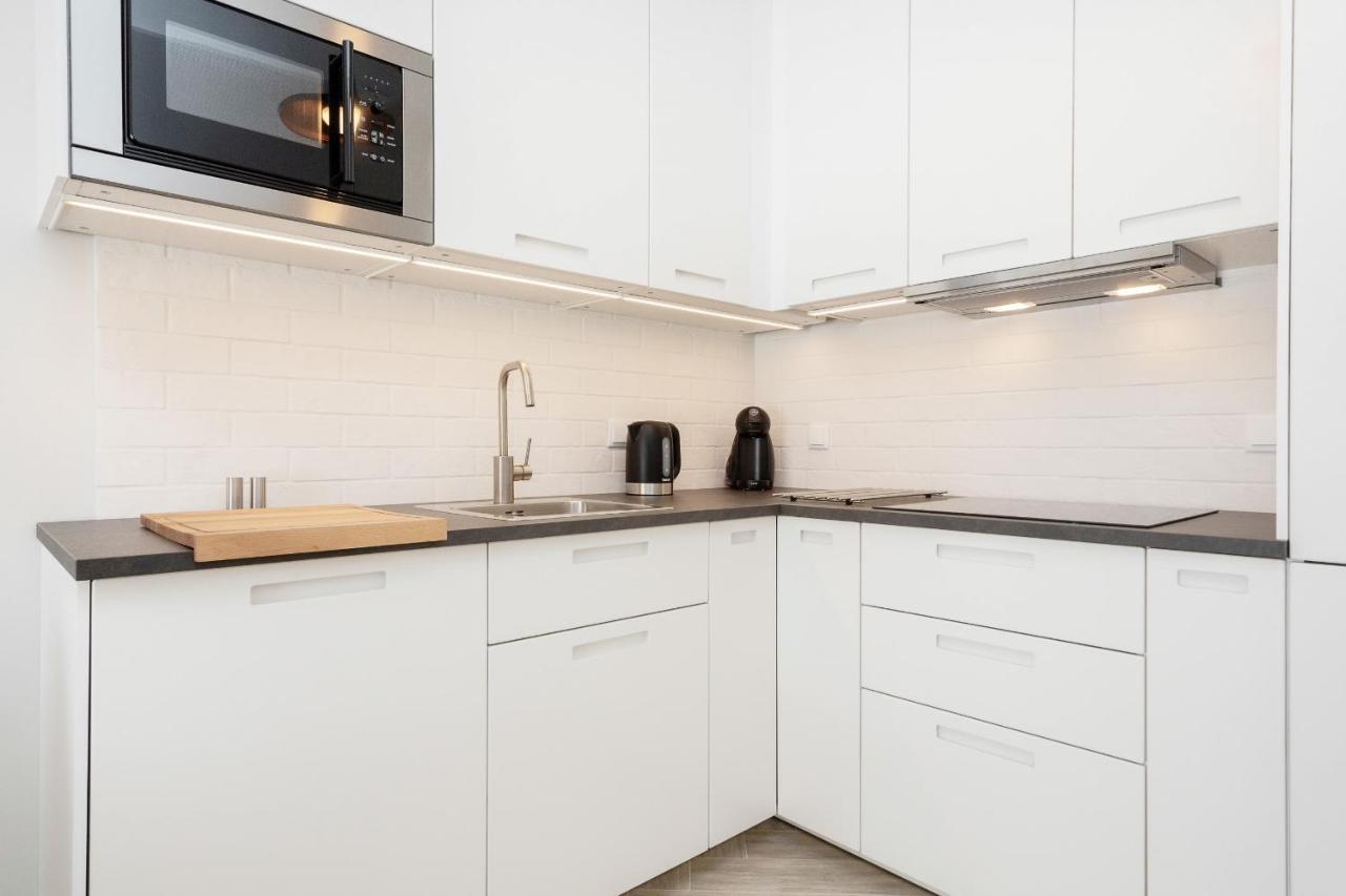 Apartments Rondo Wiatraczna By Noclegi Renters Varsovie Extérieur photo