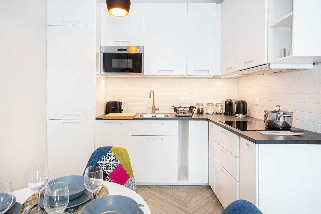 Apartments Rondo Wiatraczna By Noclegi Renters Varsovie Extérieur photo