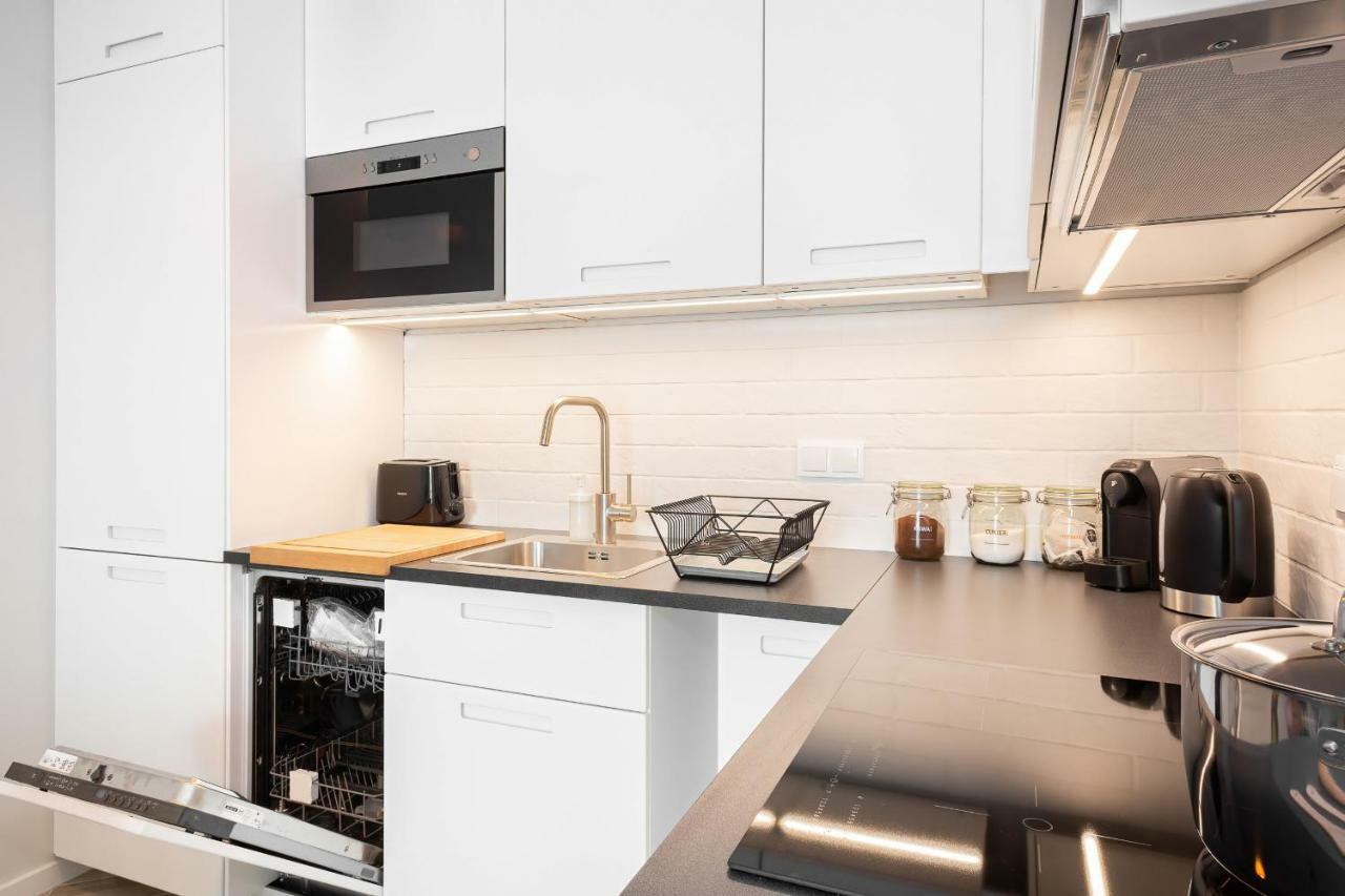 Apartments Rondo Wiatraczna By Noclegi Renters Varsovie Extérieur photo