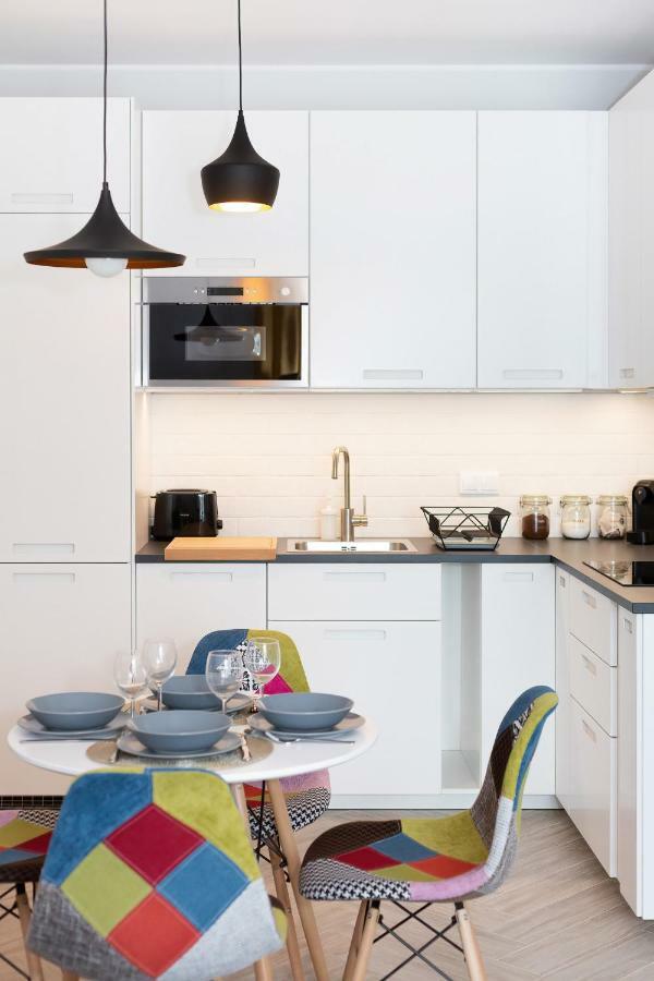 Apartments Rondo Wiatraczna By Noclegi Renters Varsovie Extérieur photo